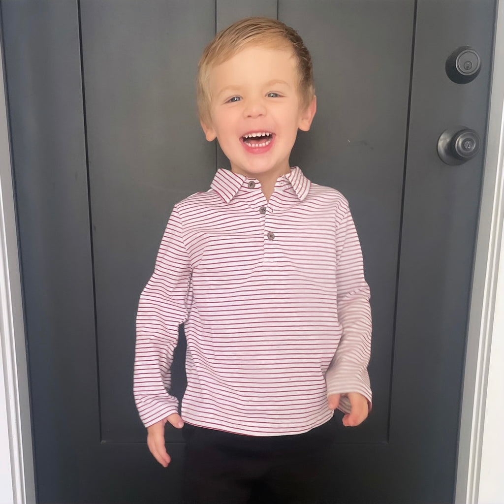 Little boy wearing the Seymour Red Stripe Polo